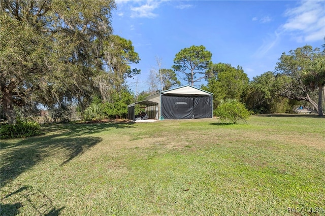 view of yard featuring a carport