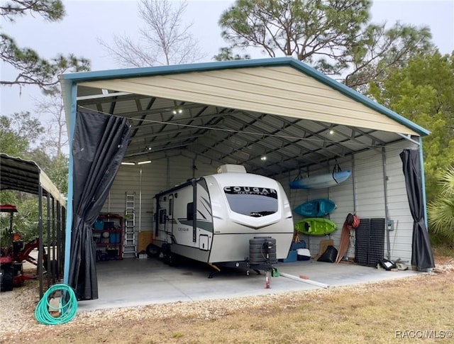 view of parking / parking lot with a carport