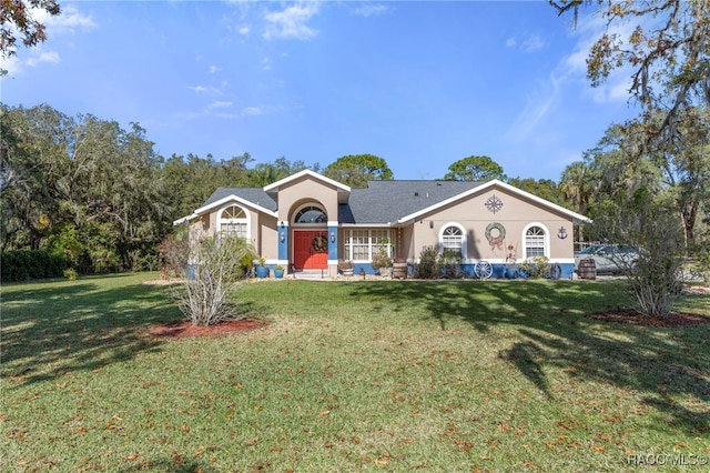 ranch-style house with a front lawn