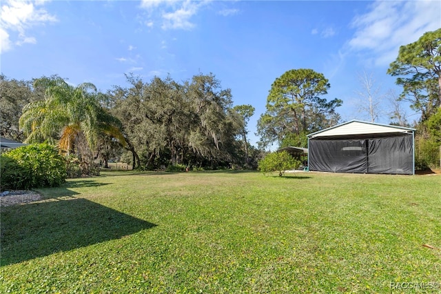 view of yard with a carport