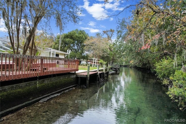 view of dock with a water view