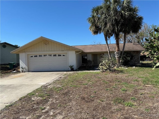 ranch-style house featuring a garage