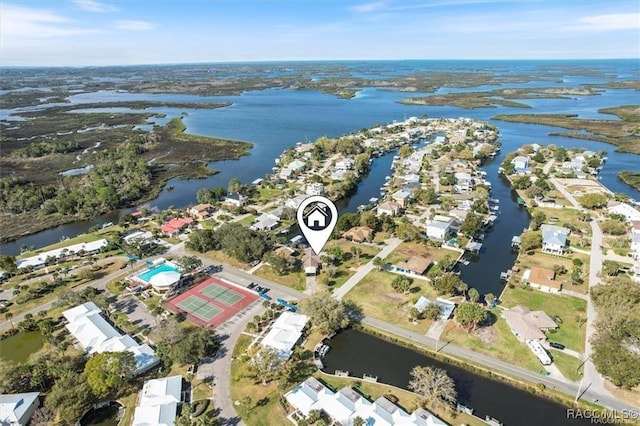 bird's eye view featuring a water view and a residential view