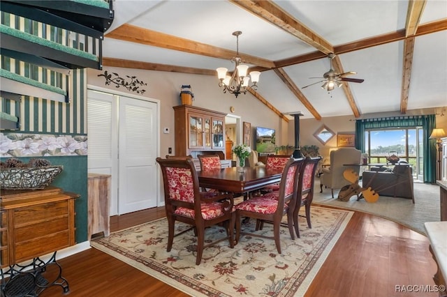 dining room featuring lofted ceiling with beams, wood finished floors, and ceiling fan with notable chandelier