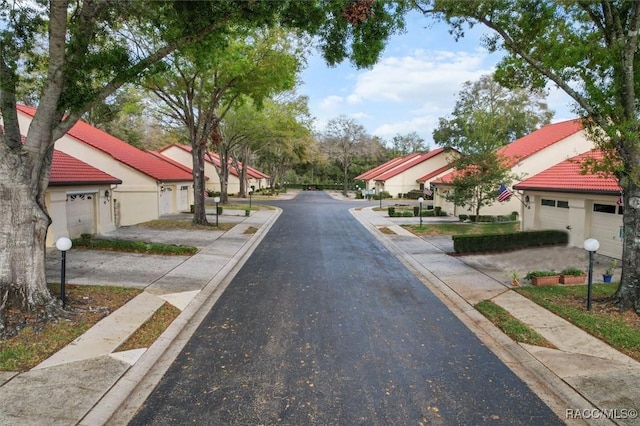 view of road featuring curbs and sidewalks