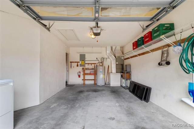 garage with water heater, washer / dryer, and a garage door opener