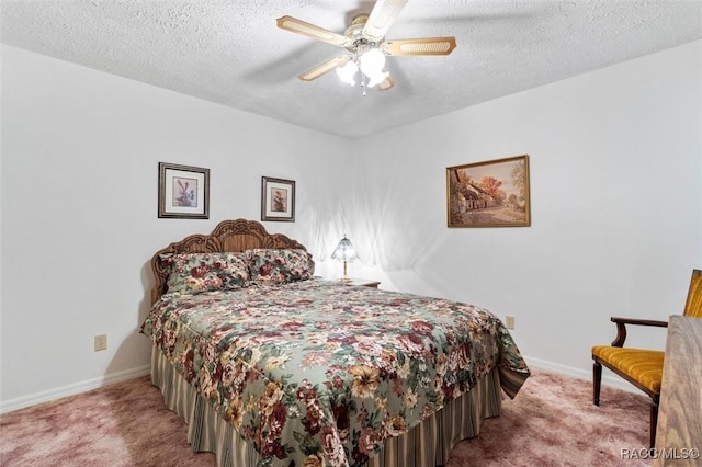 bedroom with a textured ceiling, carpet flooring, a ceiling fan, and baseboards