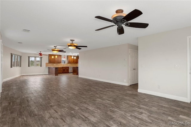 unfurnished living room with dark hardwood / wood-style floors