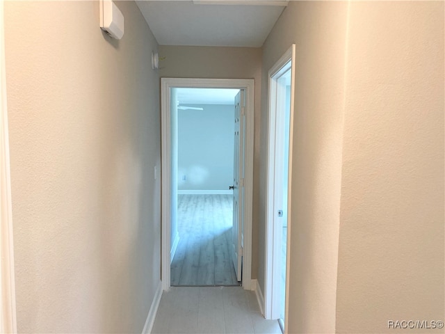 corridor featuring light wood-type flooring