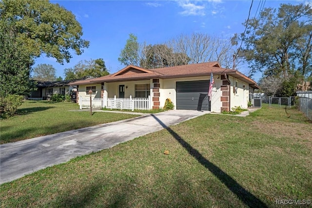 ranch-style home with a garage, cooling unit, and a front lawn