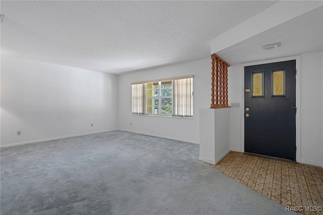 interior space with a textured ceiling