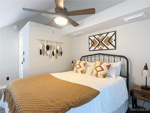 bedroom with baseboards, a ceiling fan, and visible vents