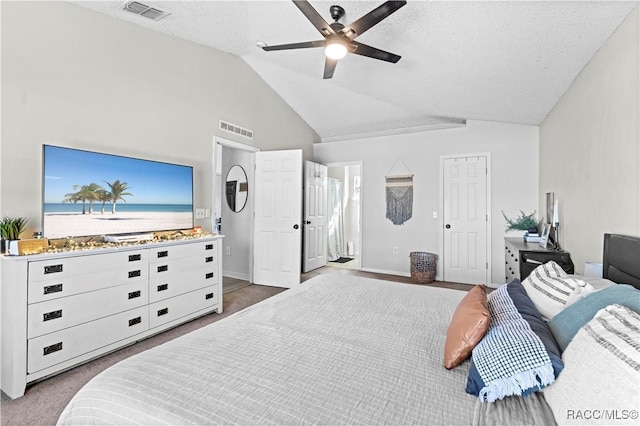 bedroom featuring a textured ceiling, ceiling fan, and lofted ceiling