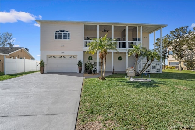 view of front of home with a garage and a front yard