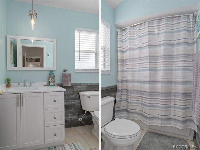 full bathroom featuring vanity, shower / bath combo, tile patterned flooring, toilet, and tile walls