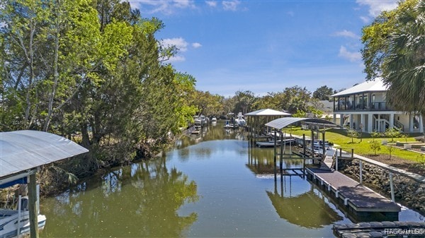 3929 N Sagomon Pt, Crystal River, FL 34428 - dock area with a water view and boat lift