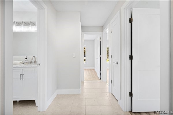 3929 N Sagomon Pt, Crystal River, FL 34428 - hallway with light tile patterned flooring
