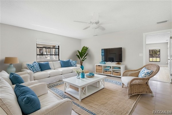 3929 N Sagomon Pt, Crystal River, FL 34428 - living area featuring a ceiling fan