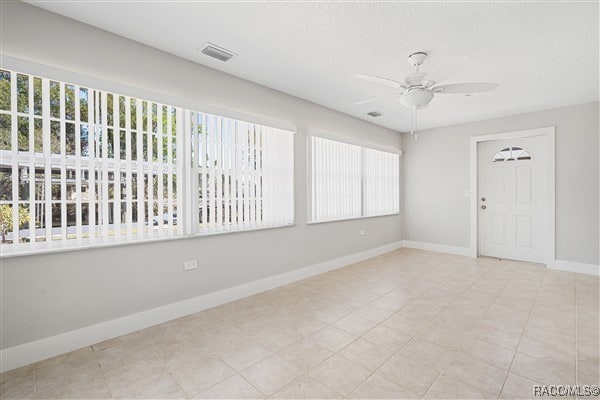 3929 N Sagomon Pt, Crystal River, FL 34428 - empty room featuring ceiling fan and baseboards