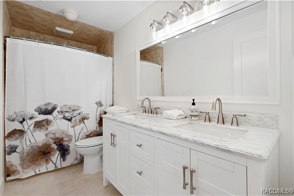 3929 N Sagomon Pt, Crystal River, FL 34428 - bathroom with double vanity, tile patterned floors, and a shower with curtain
