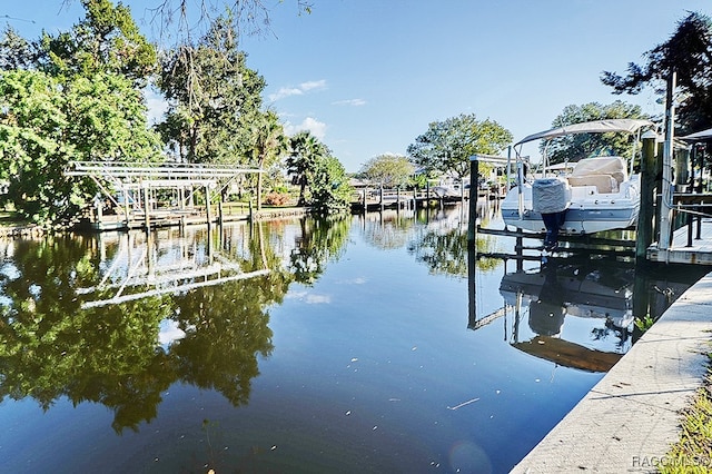 view of dock with a water view