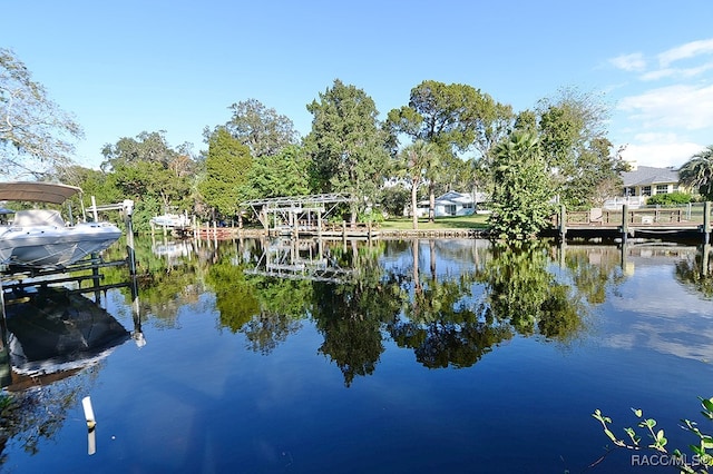 property view of water featuring a dock