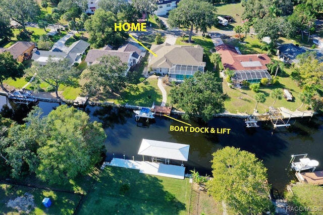 bird's eye view with a water view