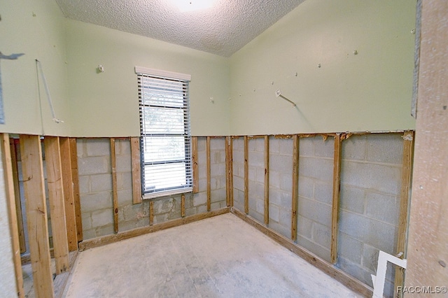 interior space featuring a textured ceiling