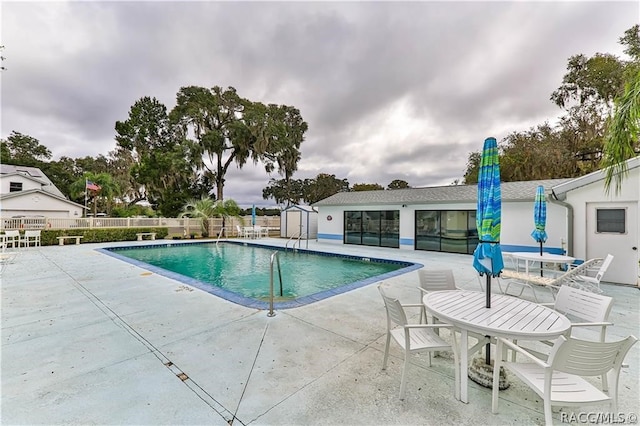 view of pool featuring a patio