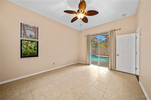 unfurnished room featuring ceiling fan and light tile patterned floors