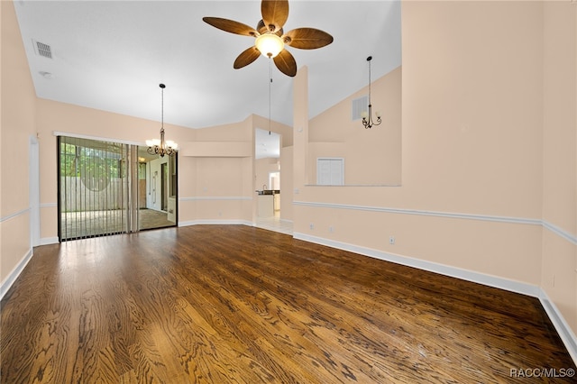 unfurnished room featuring hardwood / wood-style floors, ceiling fan with notable chandelier, and lofted ceiling