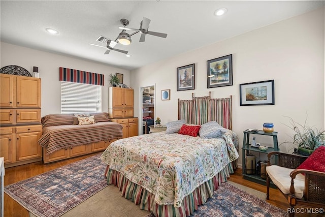 bedroom featuring ceiling fan and light wood-type flooring