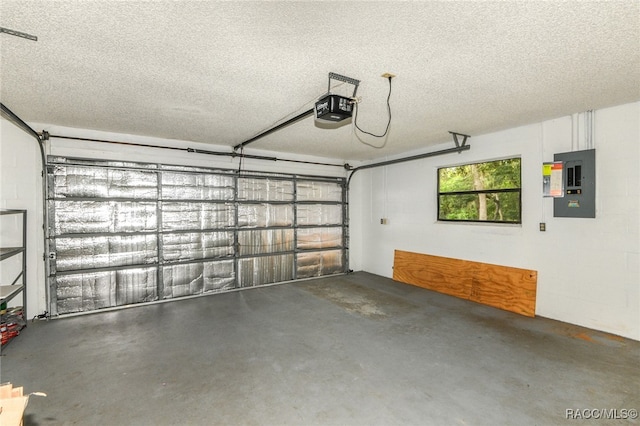 garage featuring electric panel and a garage door opener