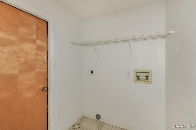 clothes washing area featuring washer hookup and hookup for an electric dryer