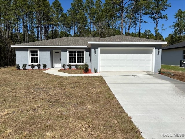 ranch-style house featuring stucco siding, driveway, a garage, and a front lawn