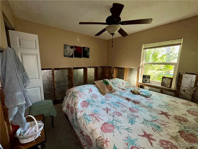 bedroom featuring ceiling fan