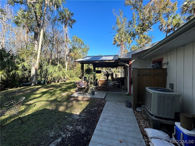 view of yard featuring central AC