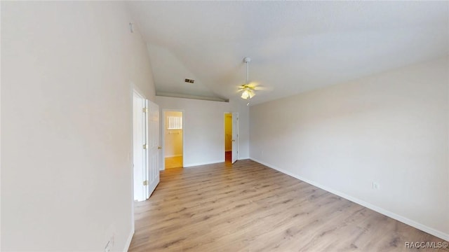 3143 Grayton Dr, Spring Hill, FL 34609 - unfurnished room with a ceiling fan, light wood-type flooring, and high vaulted ceiling