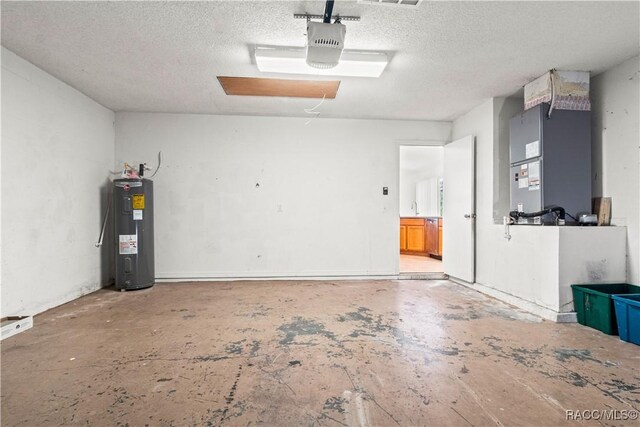 3143 Grayton Dr, Spring Hill, FL 34609 - garage featuring water heater, a garage door opener, and heating unit