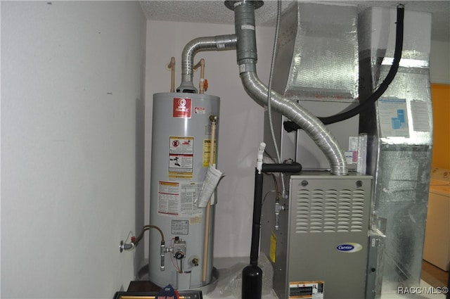 utility room featuring heating unit and gas water heater