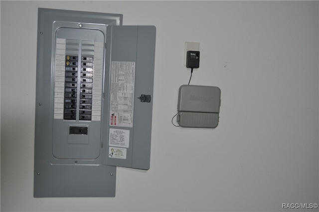 utility room with electric panel