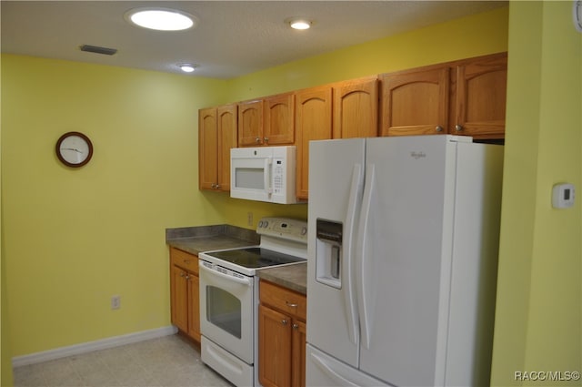 kitchen featuring white appliances