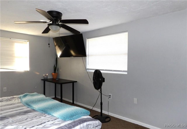 bedroom featuring ceiling fan