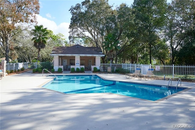 view of pool featuring a patio