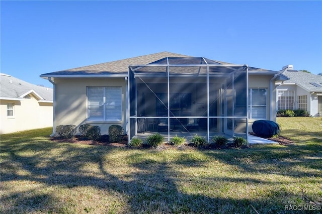 view of property exterior featuring a lawn and a lanai