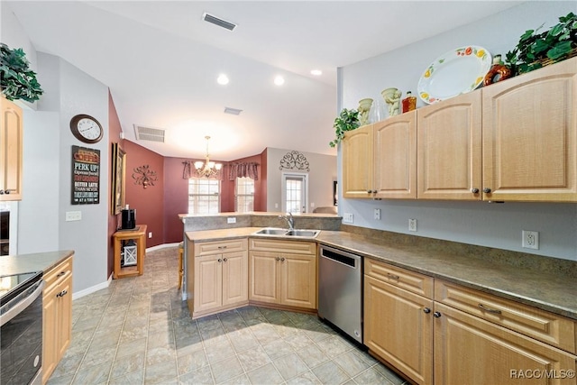 kitchen with lofted ceiling, stainless steel appliances, light brown cabinets, and visible vents