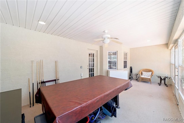 home office featuring ceiling fan and light carpet
