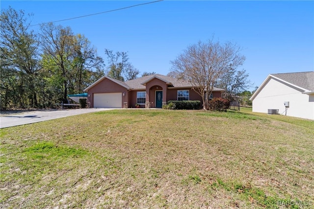 single story home featuring an attached garage, stucco siding, a front lawn, and driveway