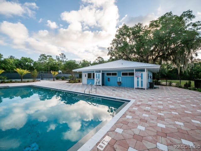 view of pool with a patio