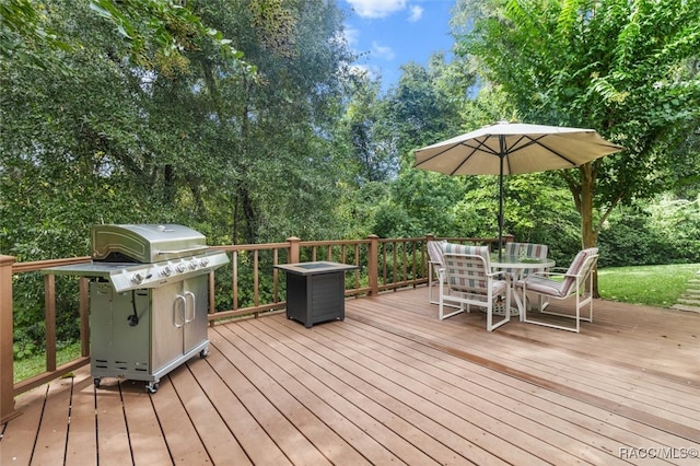 wooden deck with grilling area